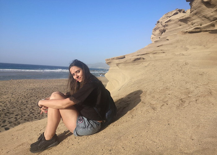 Katarzyna Trebacz hiking near the ocean