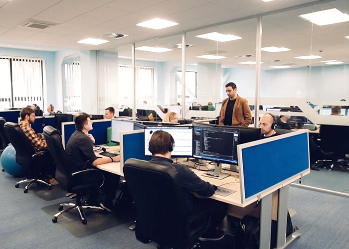 Poland team at their desks