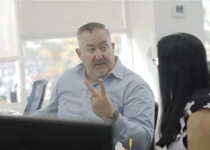 two people talking in an office